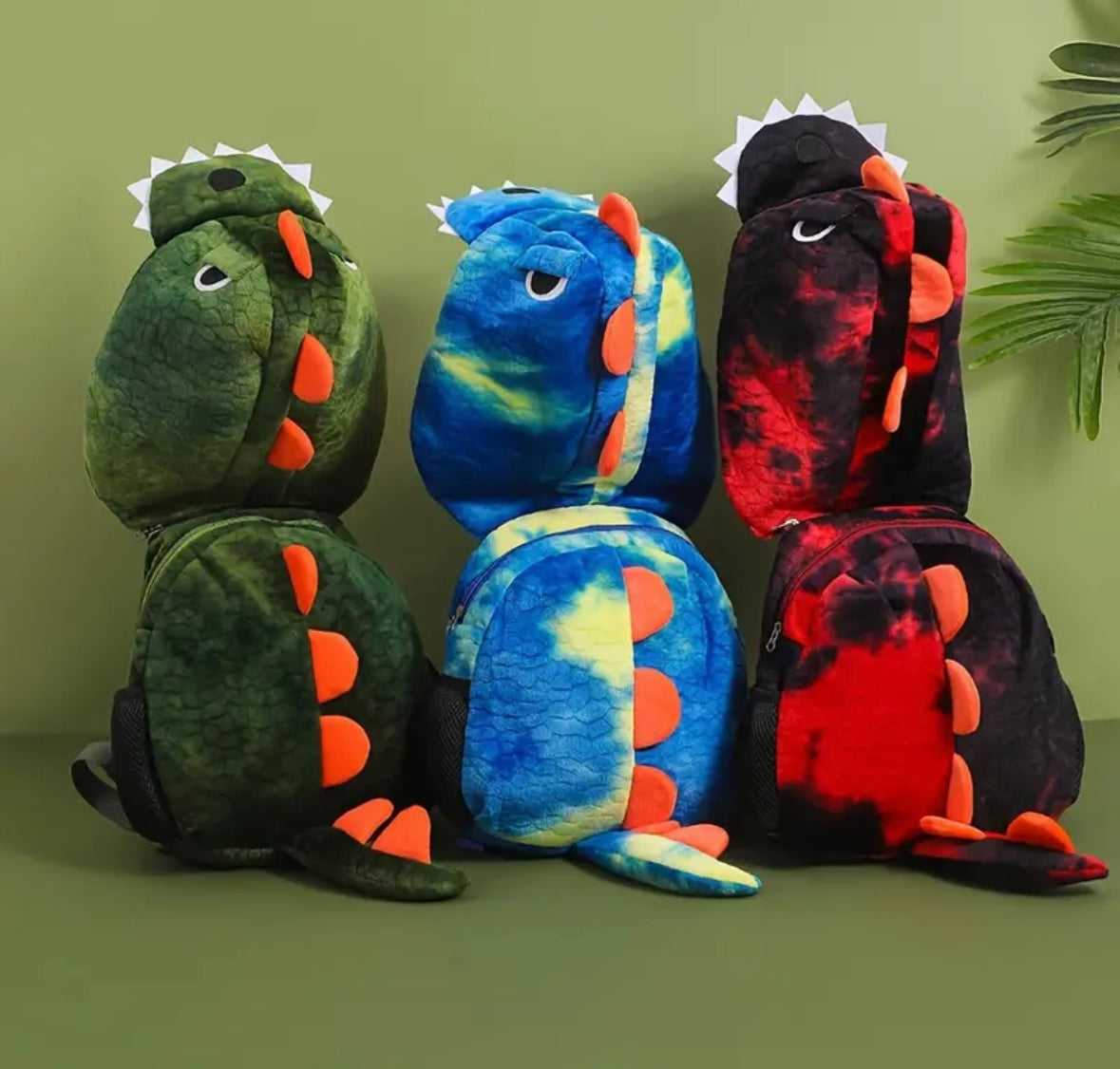 Mochila de peluche con capucha de dinosaurio