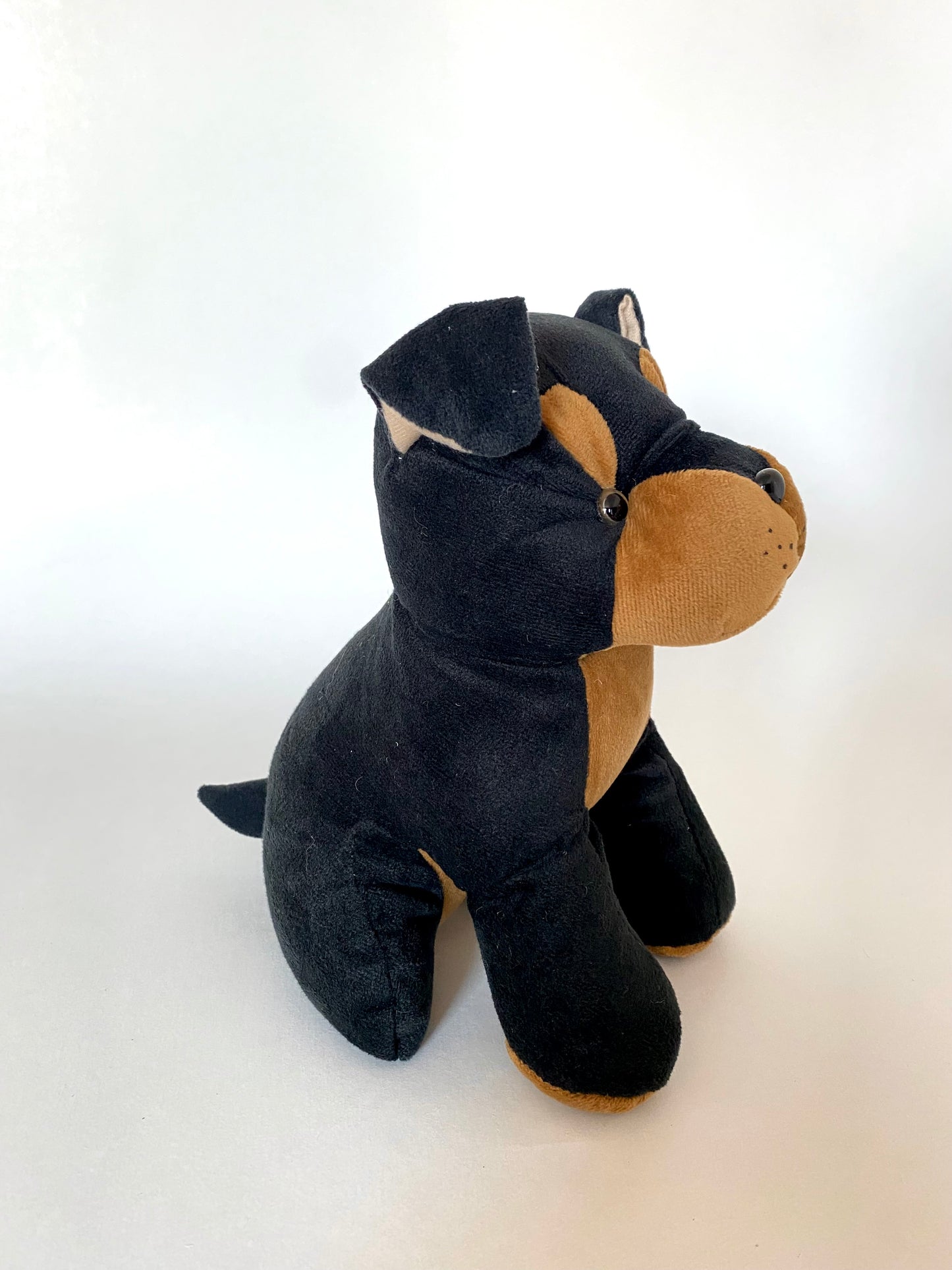 Perro Rottweiler de peluche 23 cm