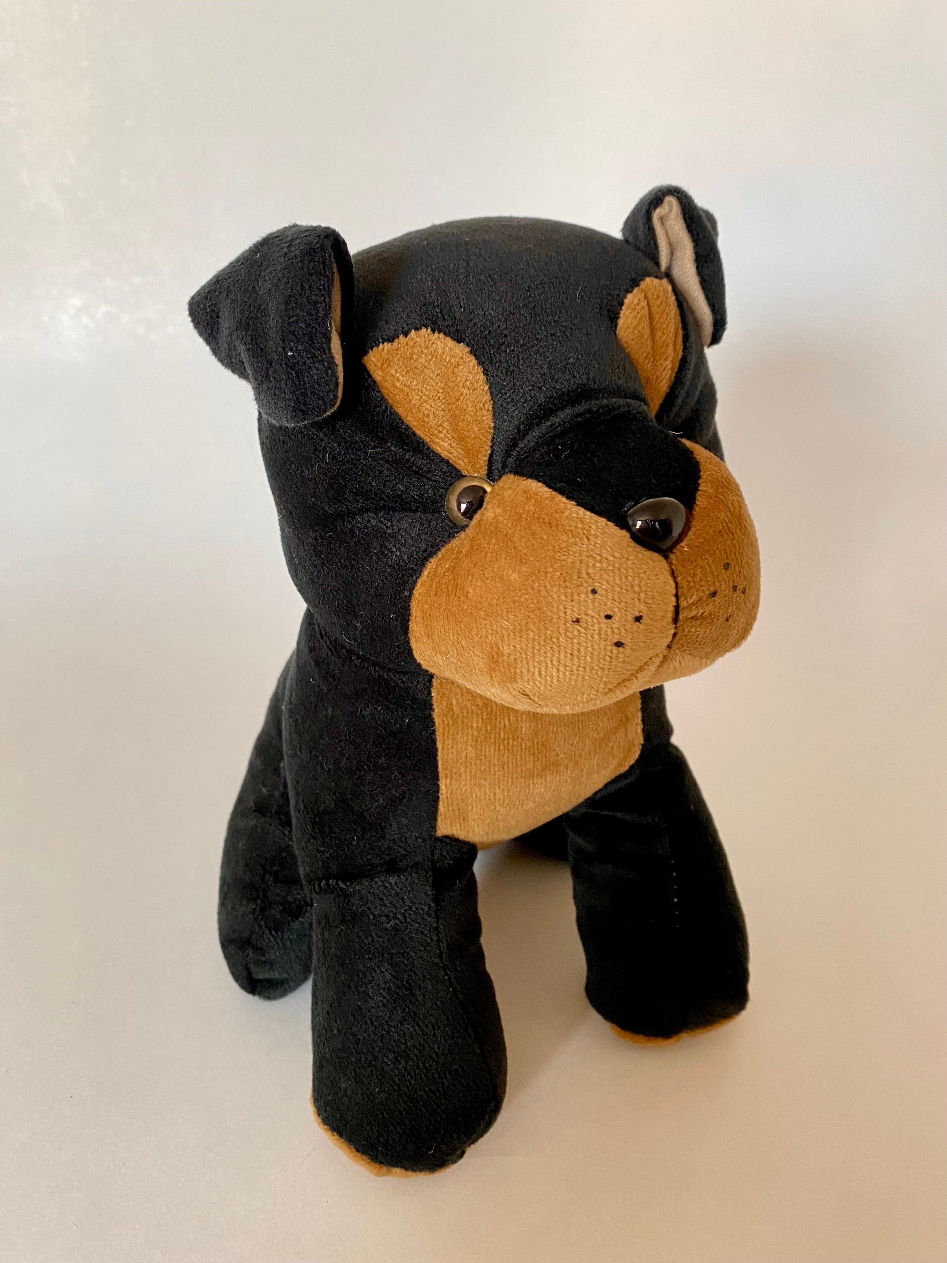 Perro peluche online rottweiler